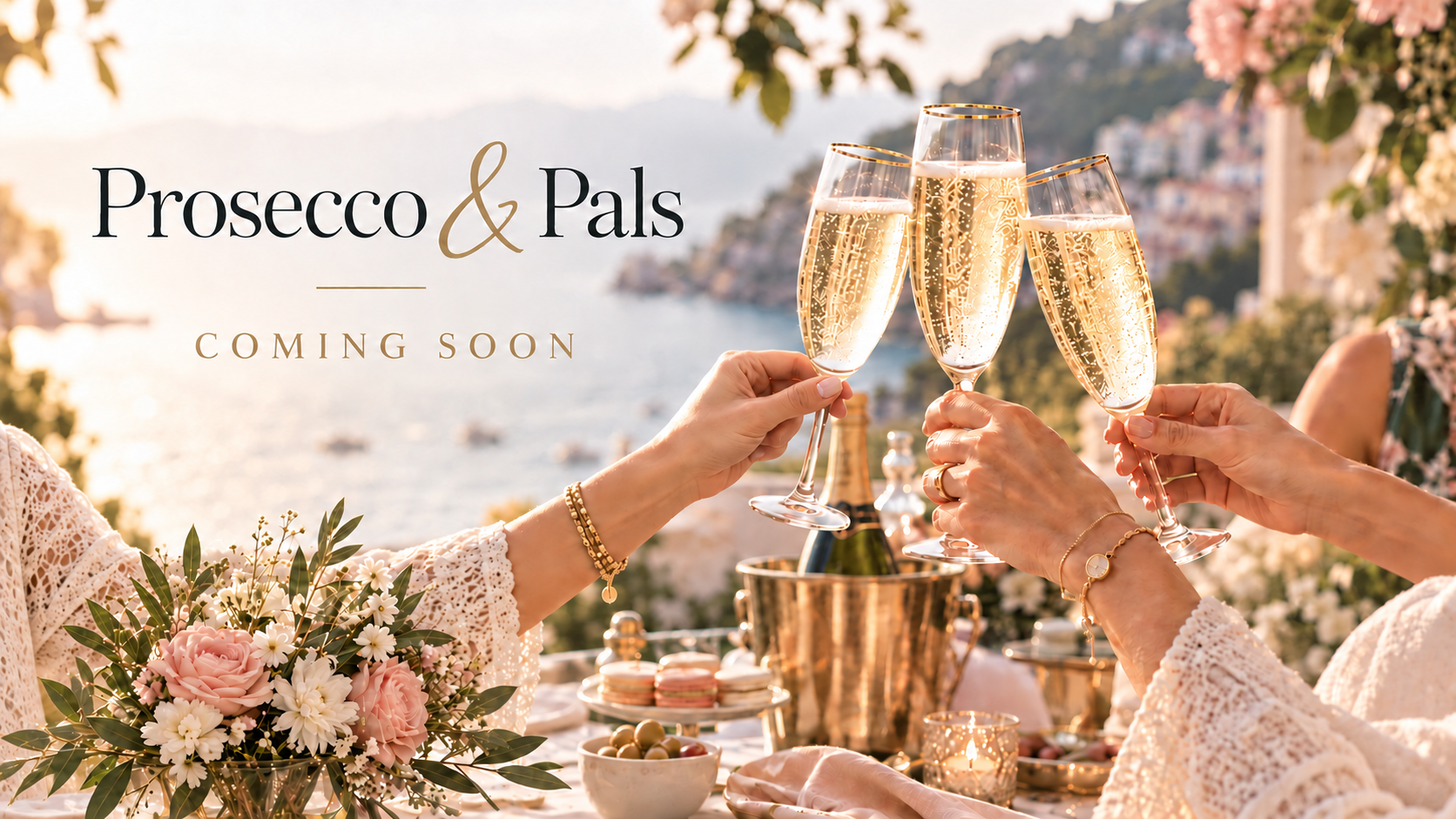 Friends toast with gold-rimmed prosecco glasses on a flower-filled terrace overlooking the Italian coast.